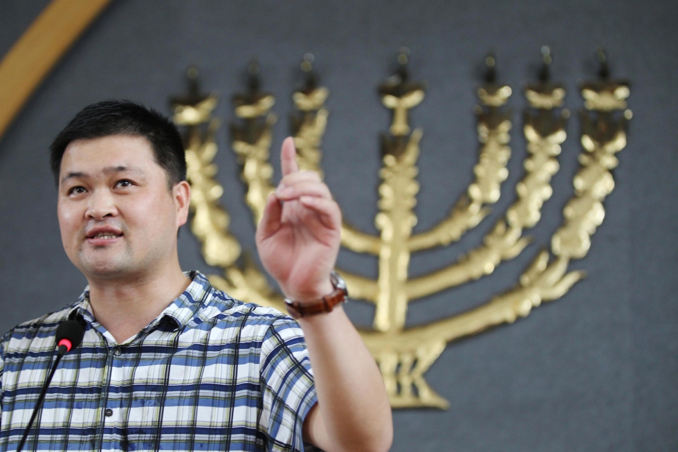 Pastor Huang Yizi, de 40 anos, preso por ir contra uma campanha de demolições de igrejas. (Foto: Scmp/ Simon Song)