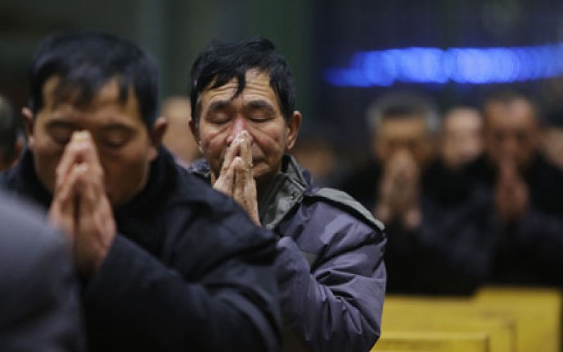 Cristão chinês em momento de oração em Xiliulin, na China. (Photo: CNS)