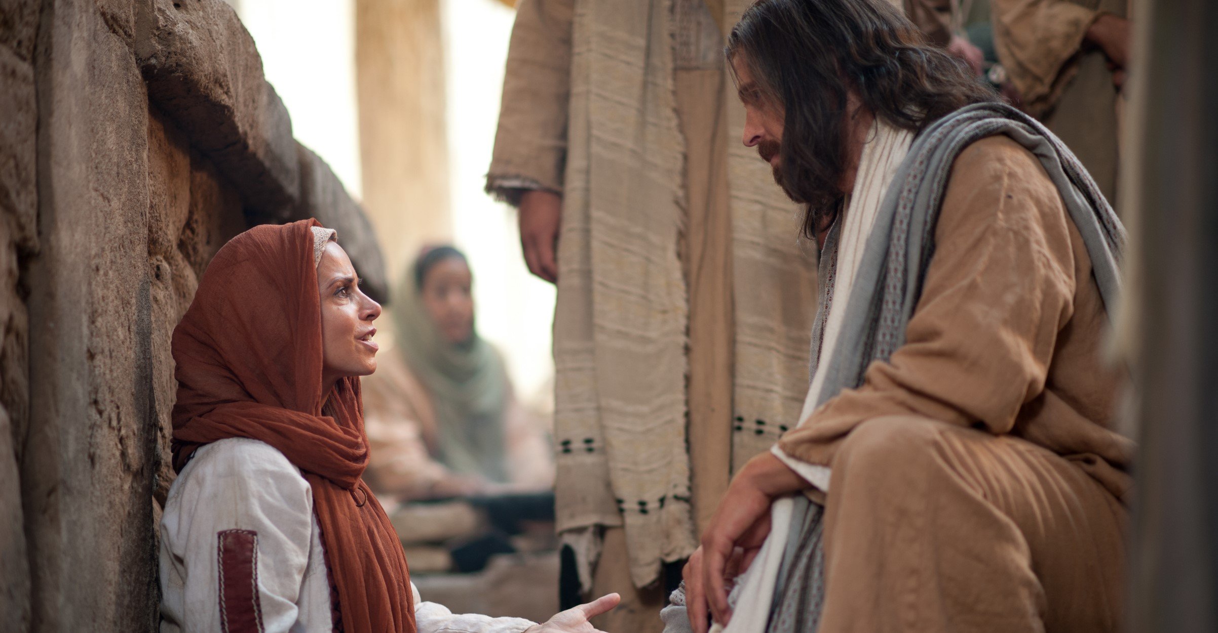 Jesus Cristo conversa com mulher que foi curada de um sangramento permanente. (Foto: lds.org)