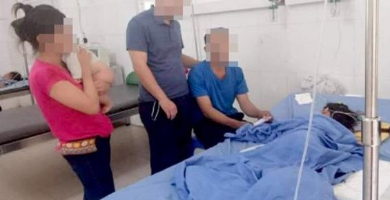 Família vietnamita sendo tratada no hospital após ataque. (Foto: Reprodução/Premier)